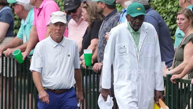 Ben Crenshaw and caddie Carl Jackson walk during the 2023 Masters Par 3 Contest.